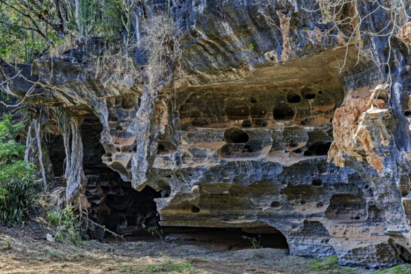 Cave entrance and rock formation in the Lapinha da Serra region in the state of Minas Gerais, Lapinha da Serra, Minas Gerais, Brazil, South America