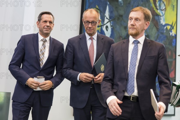 Olaf Lies (SPD, Minister President of Lower Saxony), Friedrich Merz (CDU, Federal Chancellor) and Michael Kretschmer (CDU, Minister President of the Free State of Saxony) after a press conference on the consultation between Federal Chancellor Friedrich Merz and the heads of government of the federal states at the Federal Chancellery, Berlin, 18 June 2025