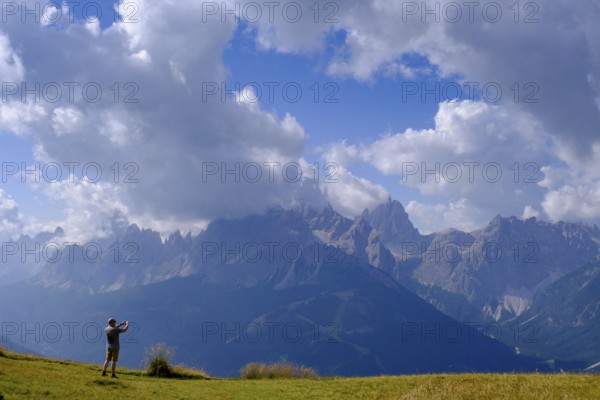Mountaineer on the helmet, view of the Sesto sundial, Sesto, Dolomites, Val Pusteria, South Tyrol, Italy, Europe
