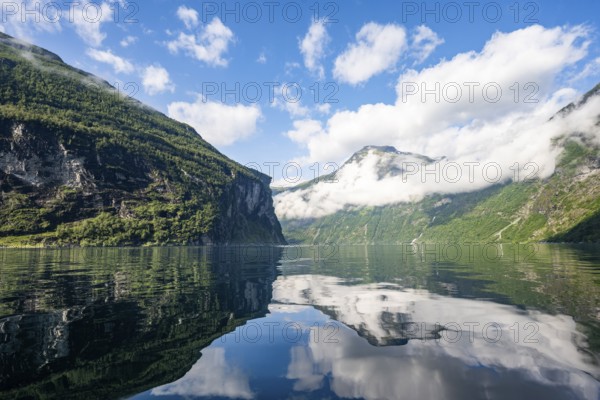 Atmospheric fjord landscape at Geirangerfjord with reflection, Møre og Romsdal, Norway, Europe