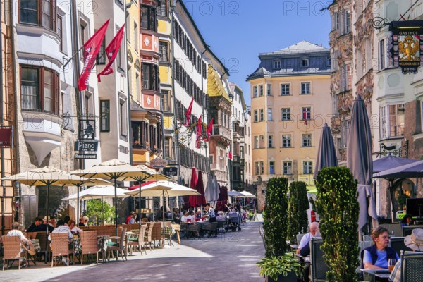Street cafés on Herzog-Friedrich-Strasse in the old town centre with the Golden Roof, Innsbruck, Inntal, Tyrolean Alps, Tyrol, Austria, Europe