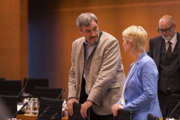 Markus Söder (CSU Chairman and Minister President of Bavaria) and Manuela Schwesig (SPD, Minister President of Mecklenburg-Western Pomerania) in front of the meeting between Federal Chancellor Friedrich Merz and the heads of government of the federal states in the International Conference Hall of the Federal Chancellery, Berlin, 18 June 2025