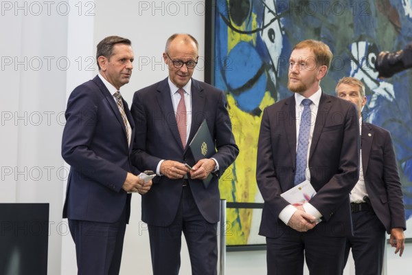 Olaf Lies (SPD, Minister President of Lower Saxony), Friedrich Merz (CDU, Federal Chancellor) and Michael Kretschmer (CDU, Minister President of the Free State of Saxony) after a press conference on the consultation between Federal Chancellor Friedrich Merz and the heads of government of the federal states at the Federal Chancellery, Berlin, 18 June 2025