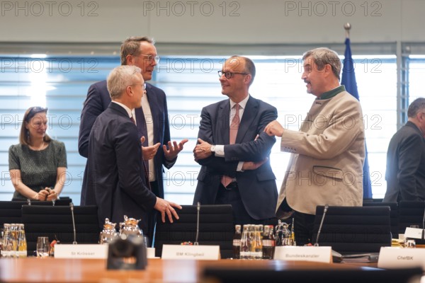 Karsten Wildberger (CDU, Federal Minister for Digitalisation and State Modernisation), Alexander Schweitzer (SPD, Minister President of Rhineland-Palatinate), Federal Chancellor Friedrich Merz (l, CDU) and Markus Söder (CSU Chairman and Minister President of Bavaria) in front of the meeting between Federal Chancellor Friedrich Merz and the heads of government of the federal states in the International Conference Hall of the Federal Chancellery, Berlin, 18.06.2025