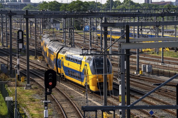 Rail transport in the Netherlands, Nederlandse Spoorwegen, Intercity train, double-decker IC VIRM, on the tracks in front of Utrecht Centraal station, Netherlands