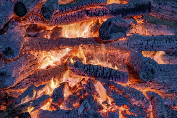Embers burning in a bonfire during a religious festival in honor of Saint John in Brazil, Minas Gerais, Brazil, South America