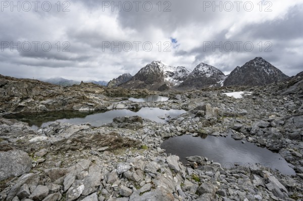 Small mountain lakes in a rocky mountain landscape, Niedere Gradenscharte, behind the summit of the Petzeck, Schober group, Hohe Tauern National Park, Carinthia, Austria, Europe