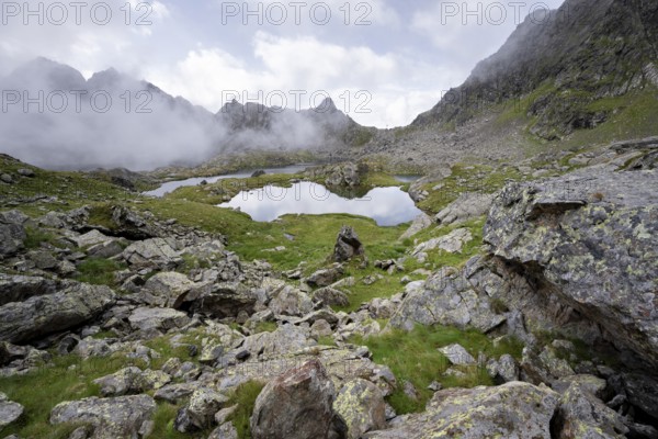 Mountain landscape with mountain lakes Wangenitzsee and Kreuzsee, cloudy mountain peaks in the morning, Schober group, Hohe Tauern National Park, Carinthia, Austria, Europe