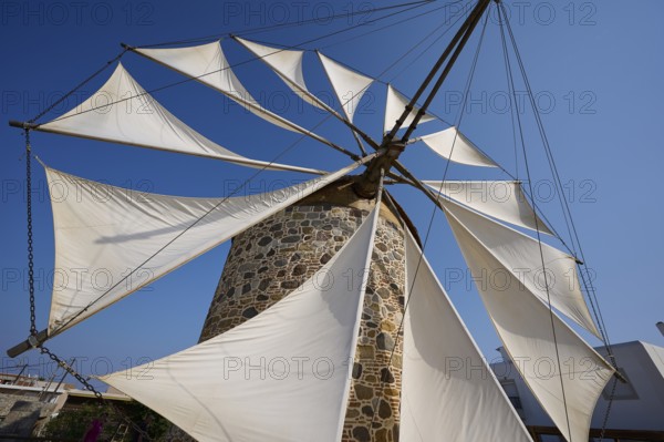 Close-up of sails on a stone windmill under a blue sky, Windmill, Antimacheia, Kos, Dodecanese, Greek Islands, Greece, Europe