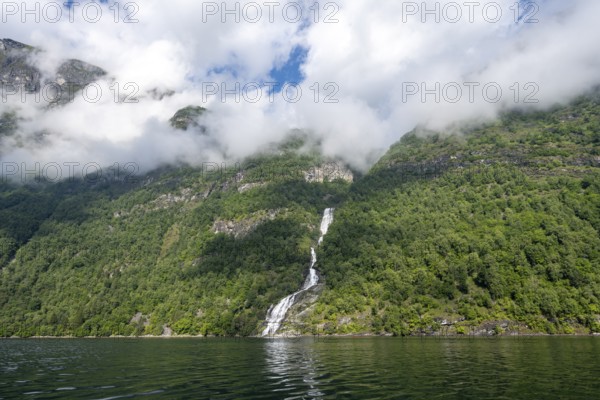 Bringefossen waterfall on the Geirangerfjord, Atmospheric fjord landscape on the Geirangerfjord, Møre og Romsdal, Norway, Europe