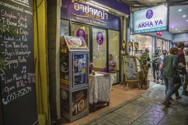 Akha Ya Massage and Spa with menu of services on downtown street in Chiang Rai, Thailand, Asia
