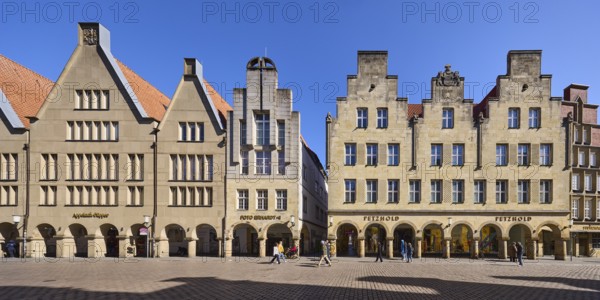 Old town, historical buildings, facade, window, gable, arcades, pedestrians as secondary motif, blue cloudless sky, street Prinzipalmarkt, Münster, Münsterland, independent city, North Rhine-Westphalia, Germany, Europe