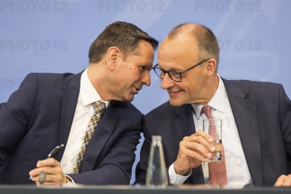 Olaf Lies (SPD, Minister President of Lower Saxony) and Federal Chancellor Merz (CDU, Federal Chancellor) during a press conference after the consultation between Federal Chancellor Friedrich Merz and the heads of government of the federal states in the Federal Chancellery, Berlin, 18 June 2025