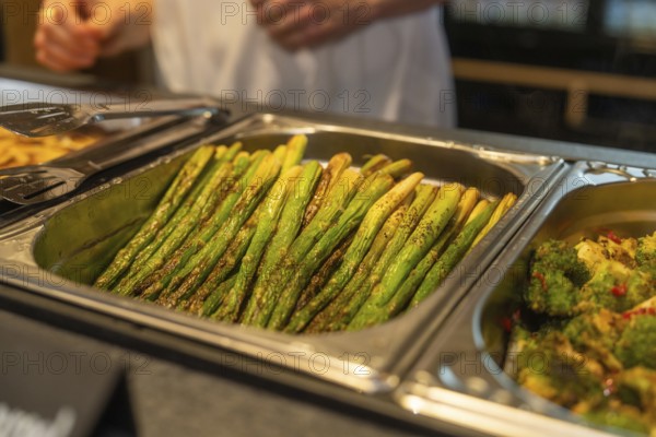 Asparagus and broccoli on a tray in a buffet setting in the kitchen, event and wedding location Kloster Lorch, Lorch, Germany, Europe