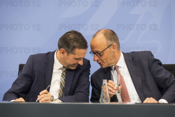 Olaf Lies (SPD, Minister President of Lower Saxony) and Federal Chancellor Merz (CDU, Federal Chancellor) during a press conference after the consultation between Federal Chancellor Friedrich Merz and the heads of government of the federal states in the Federal Chancellery, Berlin, 18 June 2025