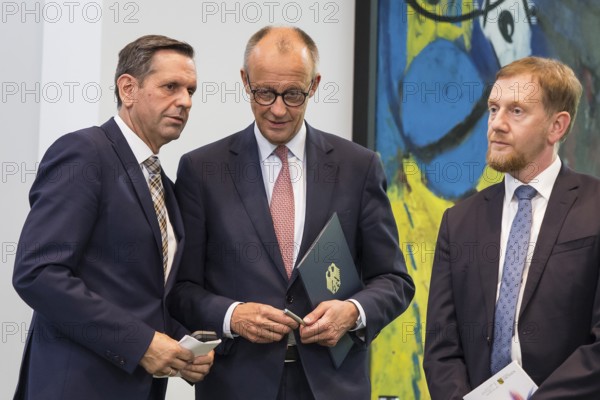Olaf Lies (SPD, Minister President of Lower Saxony), Friedrich Merz (CDU, Federal Chancellor) and Michael Kretschmer (CDU, Minister President of the Free State of Saxony) after a press conference on the consultation between Federal Chancellor Friedrich Merz and the heads of government of the federal states at the Federal Chancellery, Berlin, 18 June 2025