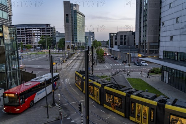 Utrecht city centre, high-rise office and residential buildings on Jaarbeursplein, at Utrecht Centraal railway station, trams, public transport stop, Netherlands