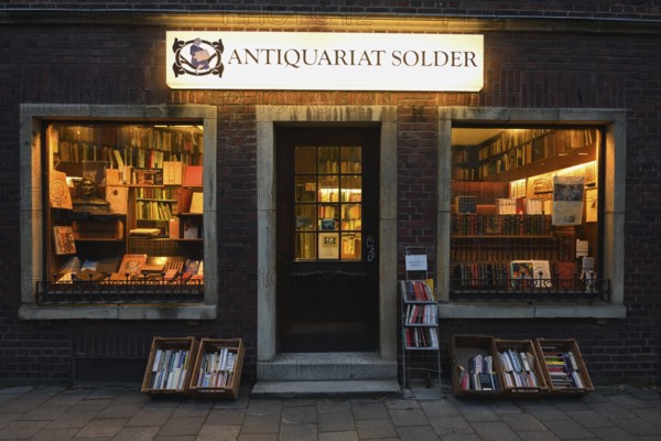 Antiquarian bookshop, Solder bookshop, Wilsberg, famous film location of the Wilsberg crime thriller in the city of Münster, atmospheric evening light, Westphalia, North Rhine-Westphalia, Germany, Western Europe, Europe