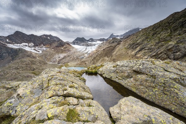 Rocky mountain landscape with dark clouds, high mountain landscape with glacier Übeltalferner, Stubai Alps, South Tyrol, Italy, Europe