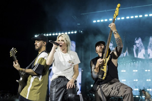 Mike Shinoda (singer and guitarist), Emily Armstrong (singer) and Dave Phönix Farrell (bassist) from Linkin Park live on From Zero World Tour 2025 at the Olympiastadion Berlin on 18 June 2025