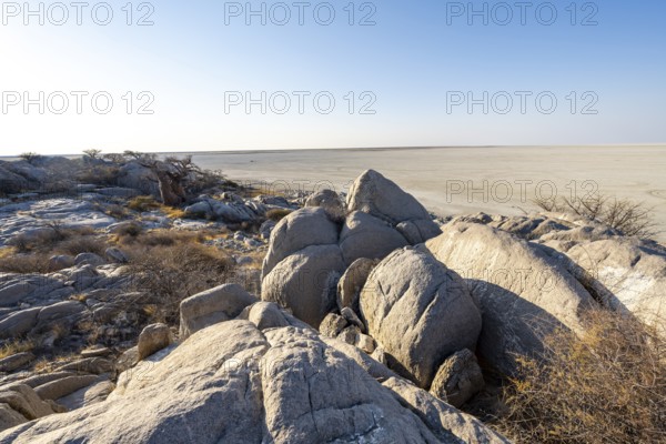 Round rocks of Kubu Island with view over the salt pan, Kubu Island (Lekubu), Sowa Pan, Makgadikgadi Salt Pans, Botswana, Africa