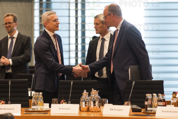 Karsten Wildberger (CDU, Federal Minister for Digitalisation and State Modernisation) and Federal Chancellor Friedrich Merz (CDU) in front of the meeting between Federal Chancellor Friedrich Merz and the heads of government of the federal states in the International Conference Hall of the Federal Chancellery, Berlin, 18.06.2025