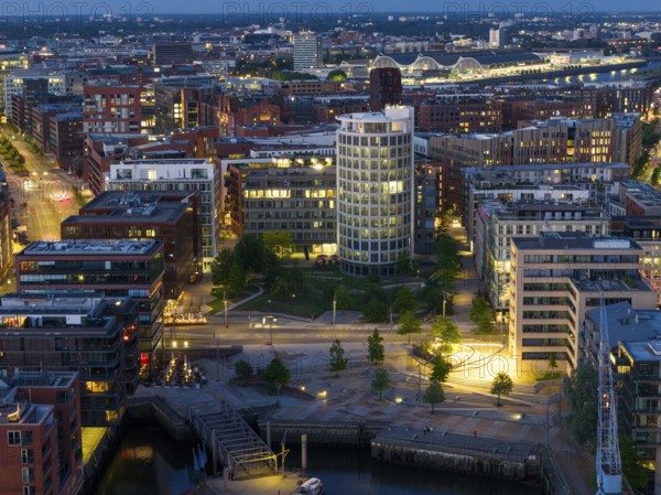 Aerial view of the Speicherstadt Hamburg with Magellan Terraces at Sandtor harbour at blue hour, Hamburg, Germany, Europe