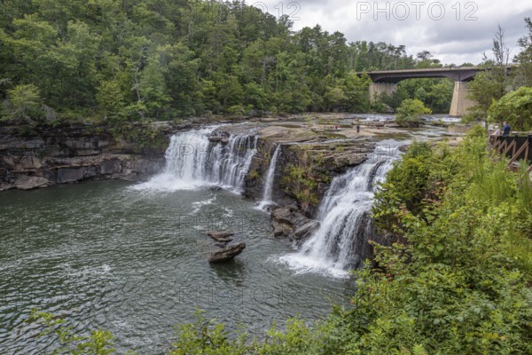 People playing on the rocks above the Little River Falls in Little River Canyon Falls Park near Ft. Payne, Alabama