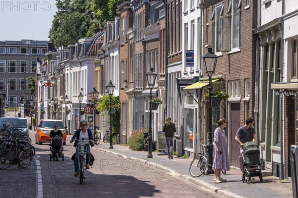 Old town centre of Utrecht, Lange Smeestraat, small side street with houses and small shops, Netherlands