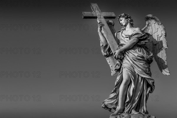 Rome, statue of an angel on the bridge in front of Castel SantAngelo. Conceptual useful for spirituality, christianity and faith