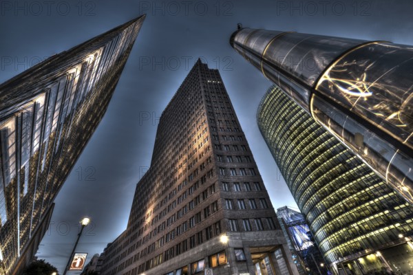 Potsdamer Platz (German: literally Potsdam Square) is an important public square and traffic intersection in the centre of Berlin, Germany, lying about 1 km (1) (100 yd) south of the Brandenburg Gate and the Reichstag (German Parliament Building), Europe