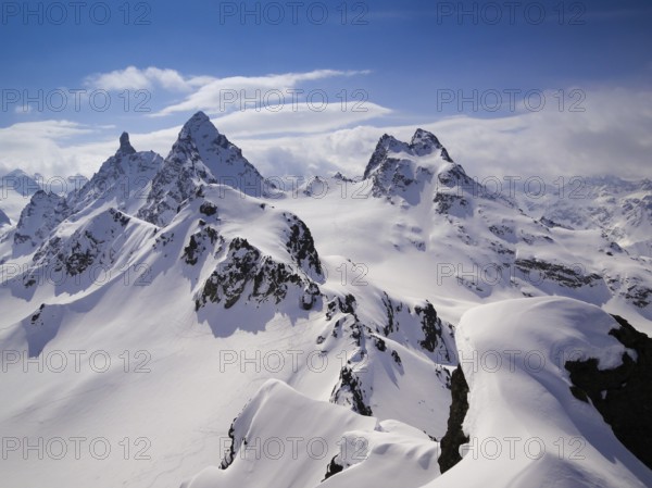 gorgeous mountain landscape in deep winter with impressive peaks in the Alps near Klosters in the Swiss Alps