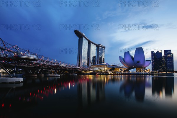 Marina Bay Sand area and Helix Bridge at dusk on a clear day on November 24th 2019