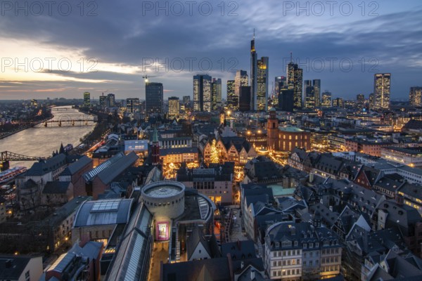 The skyline of a modern city in the evening at sunset. City photo, Römerberg and the financial centre from the cathedral tower Photographed in Frankfurt am Main, Germany, Europe
