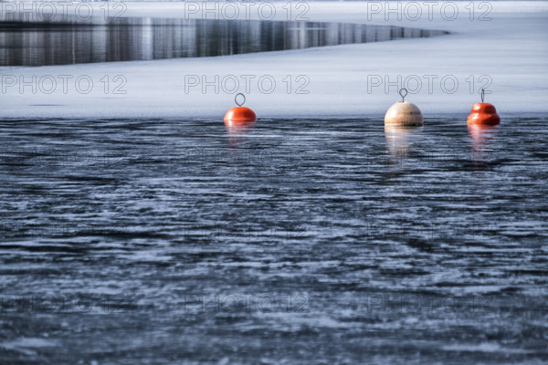 Buoys on the wintry Schluchsee