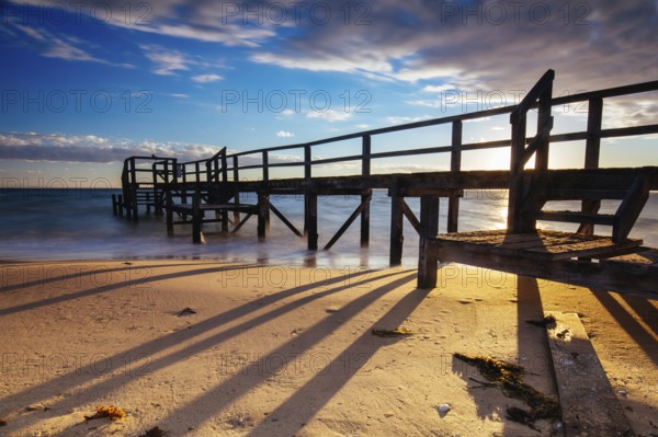Piers near Millionaire's Walk at Point King Beach on a cool winter's morning at sunrise on the Mornington Peninsula in Sorrento, Victoria, Australia, Oceania