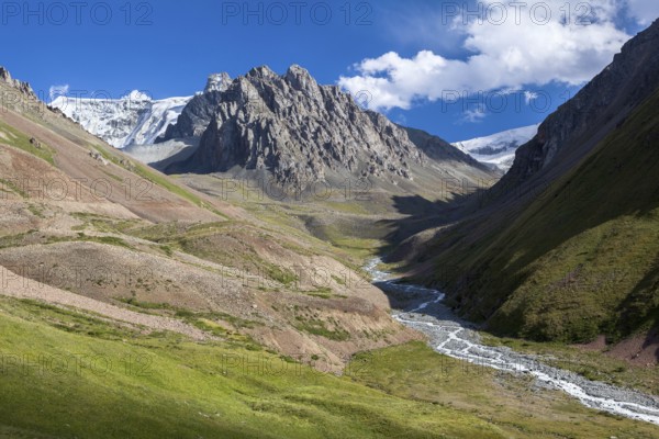 Amazing landscape of mountains, river and sky. Tien Shan, Kyrgyzstan, Asia