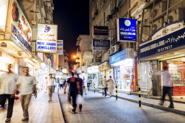 Souk shopping street in central manama city bahrain at night