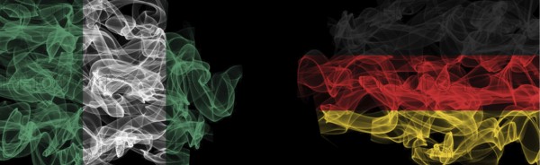 Flags of Nigeria and Germany on Black background, Nigeria vs Germany Smoke Flags