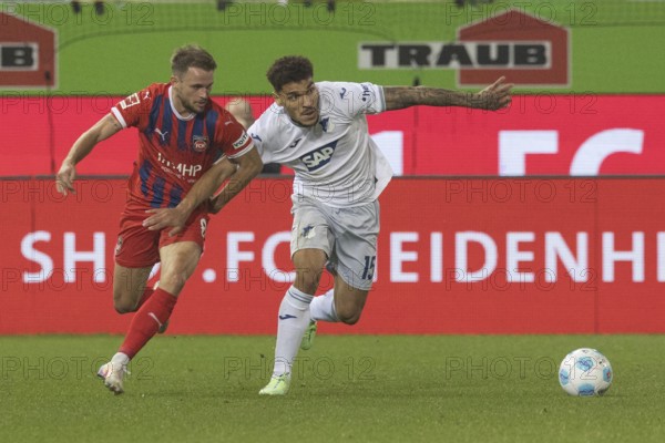 Germany: Soccer 1st Bundesliga, Matchday 8 - 1. FC Heidenheim-TSG Hoffenheim, Voith-Arena, Heidenheim, Valentin GENDREY TSG Hoffenheim right in duel with Leonardo SCIENZA 1. FC Heidenheim