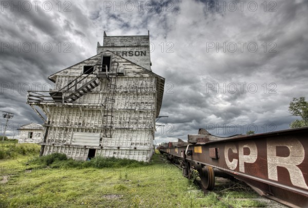 Prairie Grain Elevator in Saskatchewan Canada with storm clouds