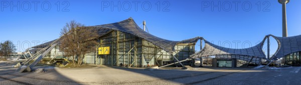 Panoramic photo of the Olympic site with the Olympic buildings in front of a blue sky, Munich, Upper Bavaria, Bavaria, Germany, Europe