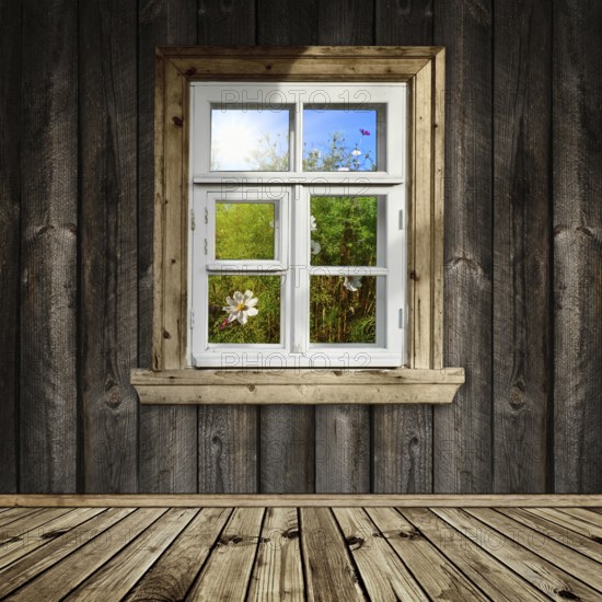 Wooden room with a window overlook the garden