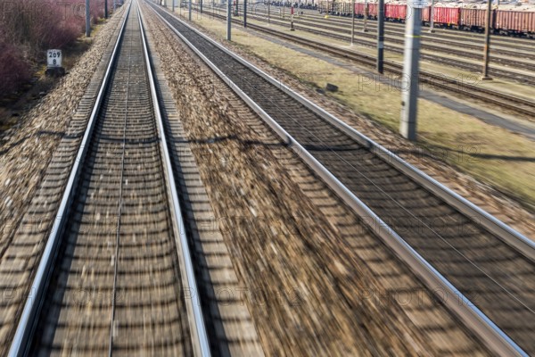 Austria, Upper Austria, Linz, Wels . Railway tracks seen from a moving train between Linz and Wels Austria, Europe