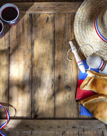 Food, Food, Chilean independence day concept. fiestas patrias. Tipical baked empanadas, wine or chicha, fat and play emboque. Decoration for 18 september party day, wooden background, top view