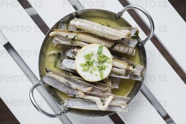Portuguese fresh razor shell seafood steamed in garlic herb white wine sauce