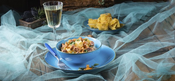 Pappardelle with cheese sauce and fresh chanterelles