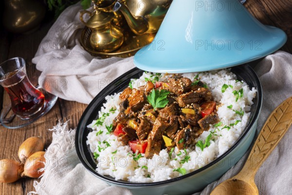 Tajin beef stew with rice, peppers and sesame seeds