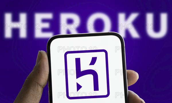 heroku logo is displayed on smartphone. Heroku is a cloud platform as a service