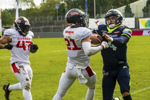 European League of Football, ELF/ Game : Helvetic Guards at Stuttgart Surge on 03. Sept. 2023, in the Gazi Stadium, Stuttgart, Germany DB # 21 Fabian Bruhin /Helvetic Guards vs. QB # 4 Reilly Hennessey/ Stuttgart Surge